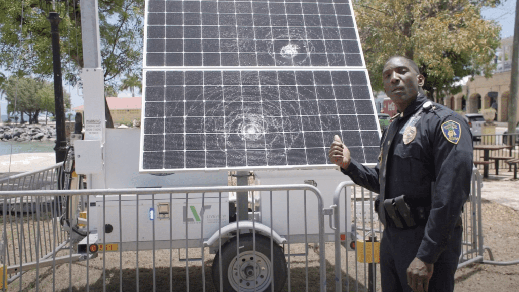 Deputy Chief of Police Uston Cornelius points to vandalism that disabled a surveillance camera before it was even activated near the Frederiksted Pier on St. Croix. (Screenshot from VIPD video)