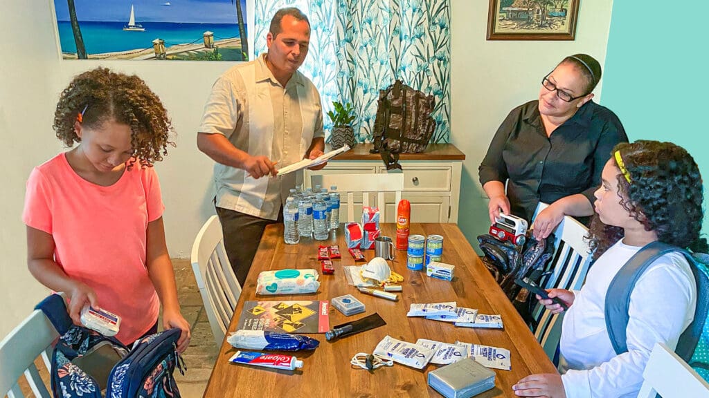 The Rivera family of St. Croix prepares their "go bags" in the event of a disaster. (Photo courtesy of the Jehovah's Witnesses)