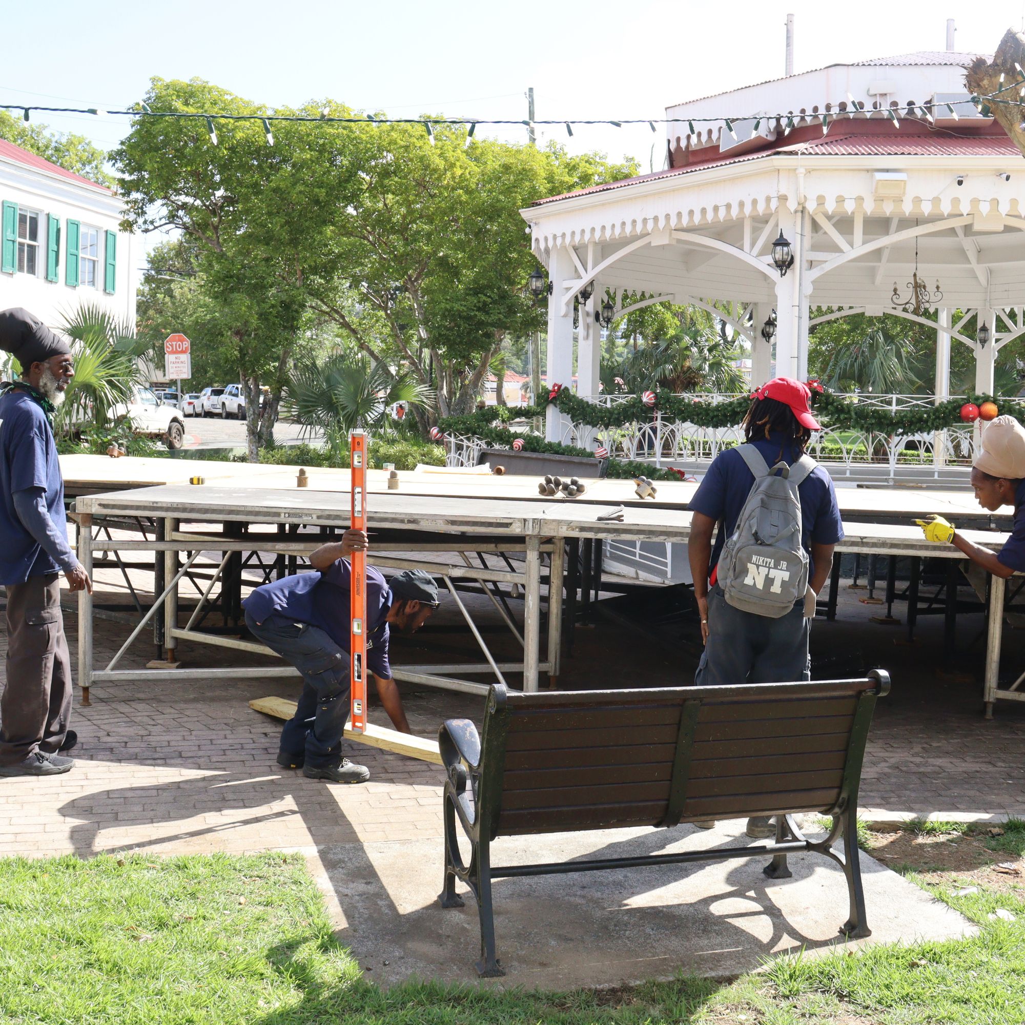 Public Works Department construction crews, with help from other agencies, are busy constructing a stage for the swearing-in of Gov. Albert Bryan Jr. and Lt. Gov. Tregenza Roach to their second term in office on Monday at Emancipation Garden on St. Thomas. (Photo courtesy Public Works Department)