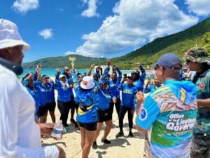 Virgin Islands Public Finance Authority, Office of Disaster Recovery and Virgin Islands Territorial Emergency Management Agency’s “Team Resilient” take the trophy for best time captured during the tricycle race. (Source photo by Nyomi Gumbs)