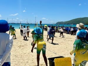 Participants in the water balloon challenge tried to delicately catch the balloons and run to the finish line without getting soaked. (Source photo by Nyomi Gumbs)
