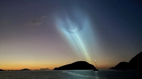 A SpaceX rocket launch is seen on Sunday while looking northwest from Francis Bay on St. John. (Photo by David Wells)
