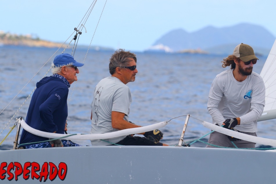 Skipper John Foster, on left, at the helm of IC24 Desperado. (Submitted photo by Ingrid Abery)