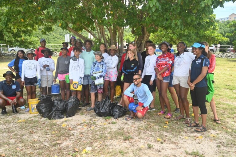 Ocean Explorers take a group photo at Brewer's Bay. (Source photo by Joshua Crawford Barry)