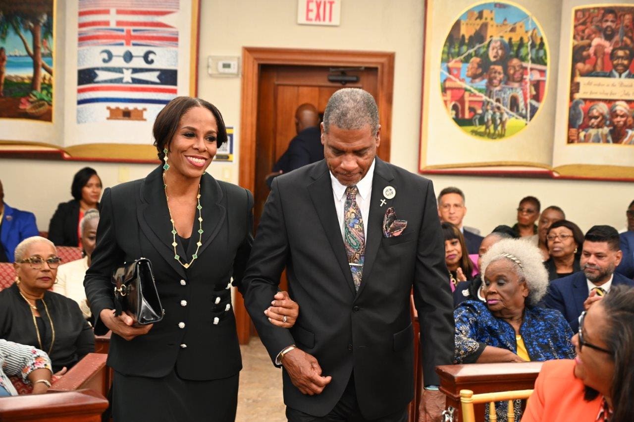 Senate Majority Leader Kurt Vialet escorts Delegate to Congress Stacey Plaskett at the State of the Territory Address on Monday at the V.I. Legislature on St. Thomas. (Photo by Barry Leerdam)