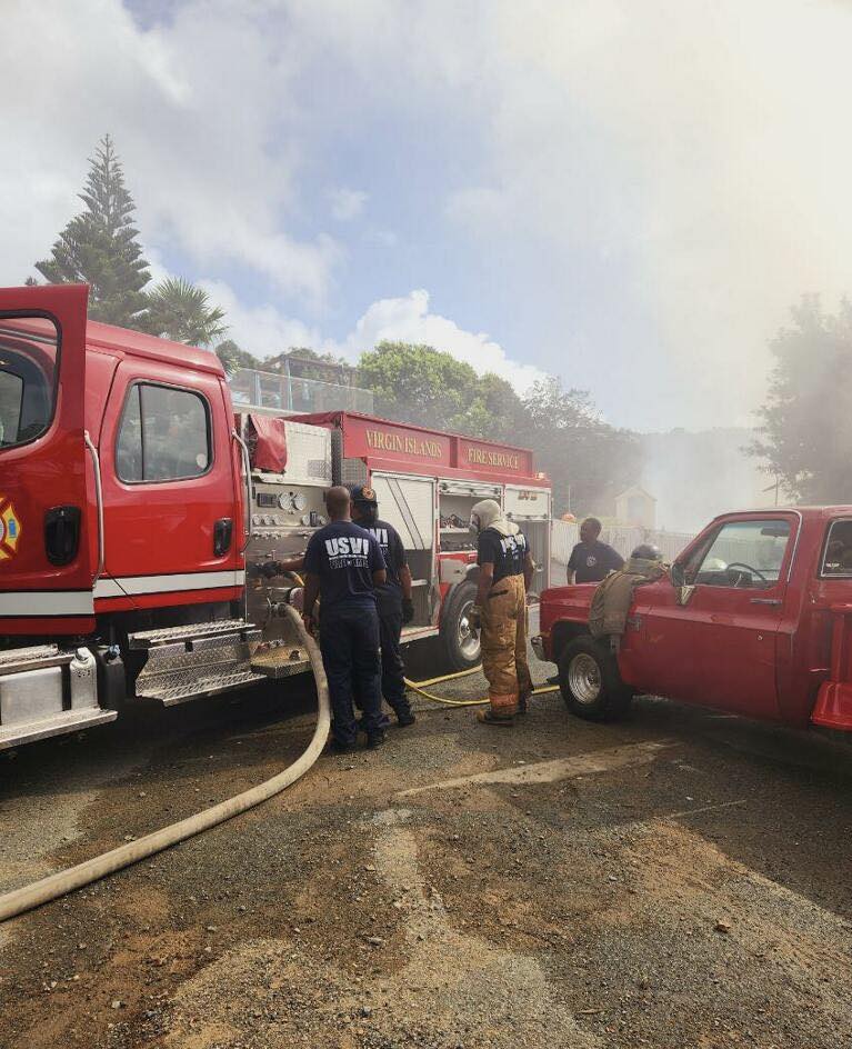 Firefighters respond to a blaze at the Blackbeard's Castle Apartments early Wednesday on St. Thomas. (Photo courtesy VI Fire and Emergency Medical Services)