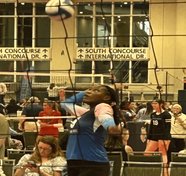 Island Mixx 12U's Jordyn Teshiera,who stands at 6 feet, 2 inches, serves Thursday at the 2026 AAU National Volleyball Championships in Orlando, Florida. (Photo by Mark J. Daniel)